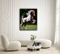 Glass wall art featuring a rearing white and brown horse on a square print